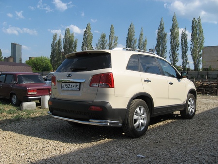 Защита заднего бампера d57+d42 длинная Kia Sorento (2010-2013) KS10-010