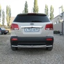 Защита заднего бампера d57+d42 радиусная Kia Sorento (2010-2013)