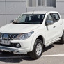 Защита переднего бампера d63дуга-d63 уголки+клыки RUSSTAL Mitsubishi L200 (2014-2019)