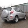 Защита заднего бампера уголки d57+d42 двойные Toyota RAV4 (2009-2012)